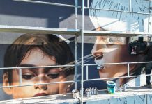 Pictură murală dedicată Nadiei Comăneci, în Onești